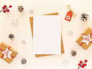 Christmas letter for Santa mockup with empty post card and Xmas decorations on white table