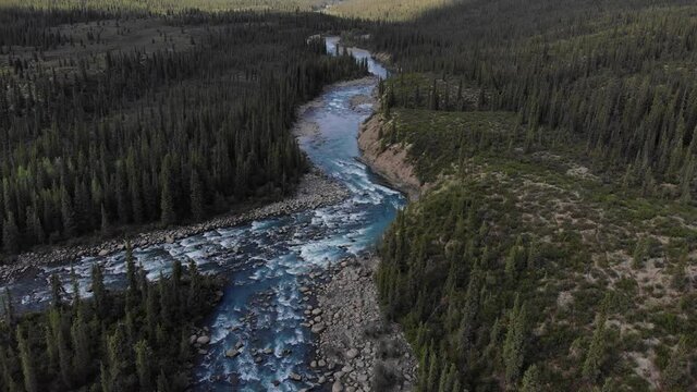 Flowing River with Mountains