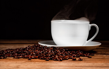 Freshly brewed coffee cup with coffee beans.