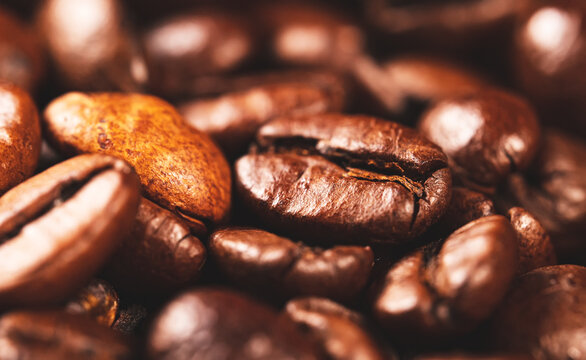 Macro view of freshly roasted coffee beans. © M-Production