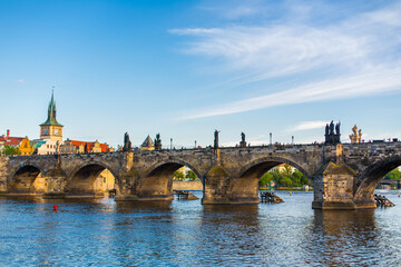 Fototapeta na wymiar Summer landscape of Prague view of the Ltava river and the famous Charles bridge