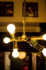 Vertical shot of a lit vintage chandelier