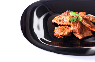 Lamb slow stewed with vegetables in a bowl close-up on white background. meat dish
