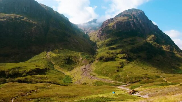 Early morning view of the famous Three Sisters of Glen Coe, in the Highlands of Scotland, UK, home to the clan McDonald