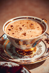  Cappuccino Coffee  in golden cup