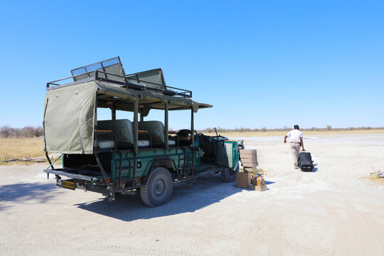 Safari truck with supplies that were just dropped off from a small plane that I was about to board.  Botswana, Africa
