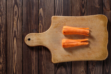carrot on a cutting board. carrots,
