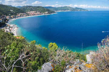 Naklejka premium Noli, in a very sunny day, its towers and a very blue sea, Ligury, Italy