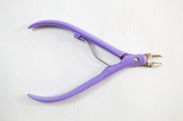 Metal sewing pliers with white background