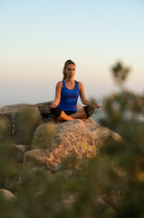 meditating girl on the mountain