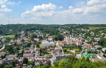 Fototapeta na wymiar Beautiful summer view from the Bona Hill to Kremenets city and former Jesuit Cathedral. Ternopil Region, Ukraine