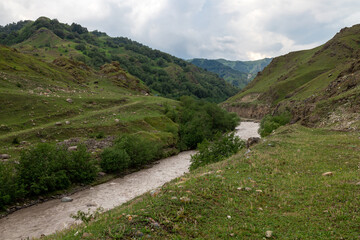 Mountain Landscape With A River. Panorama of a mountain river.