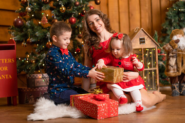 Happy family spend Christmas at home. Family holidays, Christmas tale. Best childhood memories