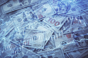 Double exposure of forex graph drawing over us dollars bill background. Concept of financial markets.