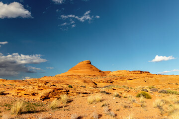 Getting close to the desert surface to capture the hill, The Chains, Page, Arizona, USA