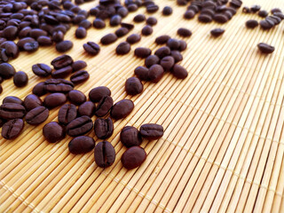 roasted coffee beans on wooden serving