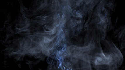 Blue Smoke Jet From The Bottom Up Rises Between The Gray Smoke.