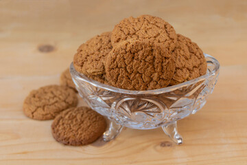 Tasty biscuits on wooden background close up