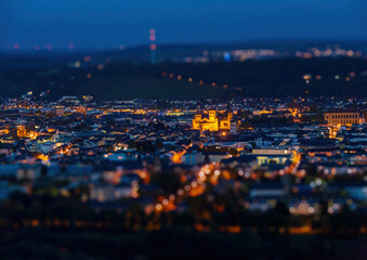Night shot of the illuminated old German city of Trier, photographed from a hill
