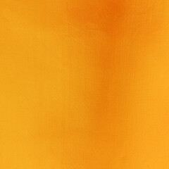 Gold or yellow paint on cement wall texture or background