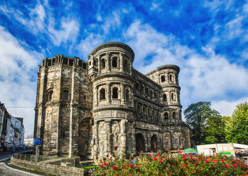 Photography of the Porta Nigra, a large Roman city gate in Trier, Germany.