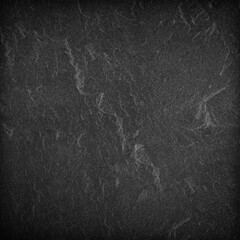 Dark grey black slate background or texture.