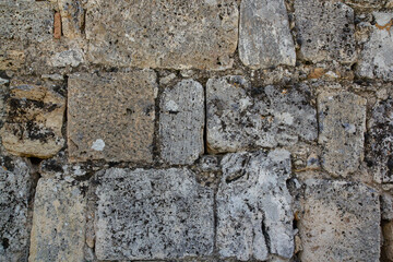 Texture of an old stone wall. Vintage back from shell rock.
