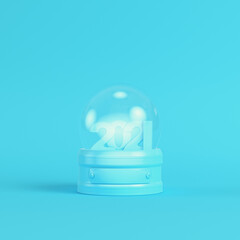 Snow globe with 2021 figures on bright blue background in pastel colors