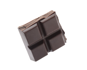 Piece of delicious dark chocolate isolated on white