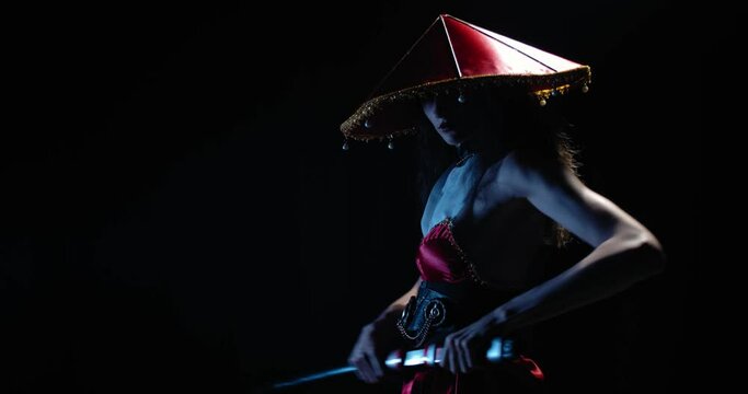 Dramatic lighting, young geisha in red dress and a hat pulls out a katana, 4k