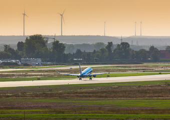 Fototapeta na wymiar A commercial aircraft takes off from Nuremberg Airport in southern Germany