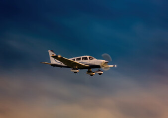 A propeller sports plane on approach to Nuremberg Airport in southern Germany