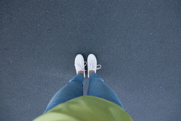 Woman standing outdoors, top view with space for text. Choosing way concept.