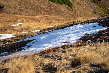 Snow in the high elevation tundra in Rocky Mountain National Park. Snow remains here year round