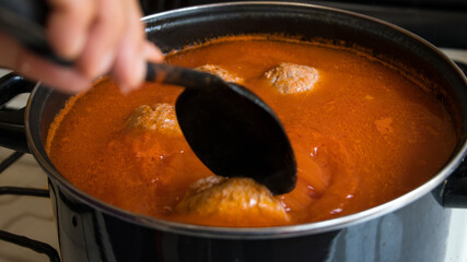 Chef cooking meatballs for food