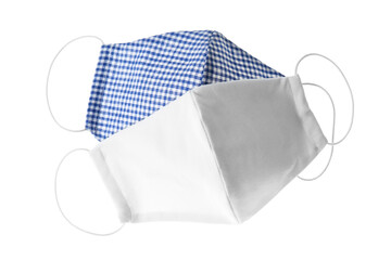 Homemade protective face masks isolated on white, top view