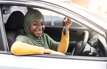 Buying New Car. Happy Black Muslim Woman Showing Keys Of Her Automobile