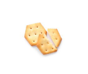 Delicious crispy crackers isolated on white, top view