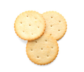 Delicious crispy crackers isolated on white, top view