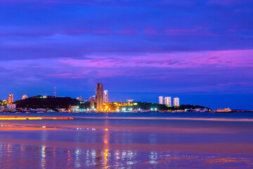 Pattaya City and Sea with sunset, Thailand. Pattaya city skyline and pier at sunset in Pattaya Chonburi Thailand,ASIA.
