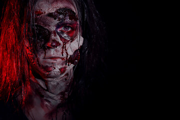 Scary zombie on dark background, space for text. Halloween monster