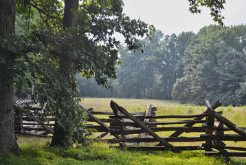 Fenced Shiloh Battlefield with Forest on Humid Day in Virginia