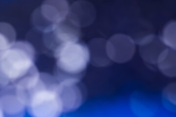 Bokeh background or multiple dots, white with blue background.