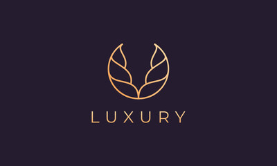 Gold abstract logo template with luxurious and elegant curved shapes