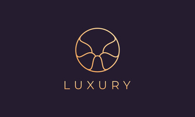 Luxury circle logo template with elegant golden shapes