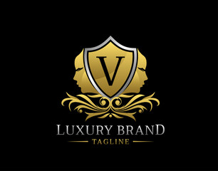 Royal Beauty Logo With V Letter. Elegant Gold Shield badge With Beauty Face Shape perfect for salon, spa, cosmetic, Boutique, Jewelry.