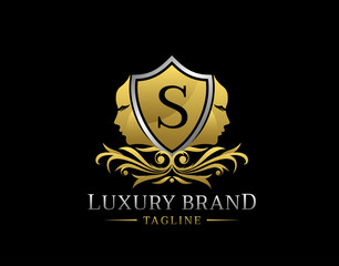 Royal Beauty Logo With S Letter. Elegant Gold Shield badge With Beauty Face Shape perfect for salon, spa, cosmetic, Boutique, Jewelry.