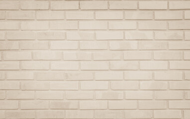 Empty Background of wide cream brick wall texture. Old brown brick wall concrete or stone pattern nature, wallpaper limestone abstract floor/Grid uneven interior rock. Home & office design backdrop.