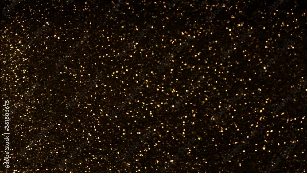Wall mural glitter background with glowing. golden sparks on a black backdrop. - Wall murals