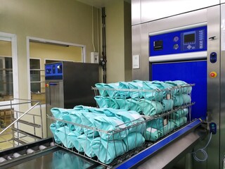 Soft Focus on Surgical gown from sterilization with a sterilizer